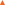 ▴